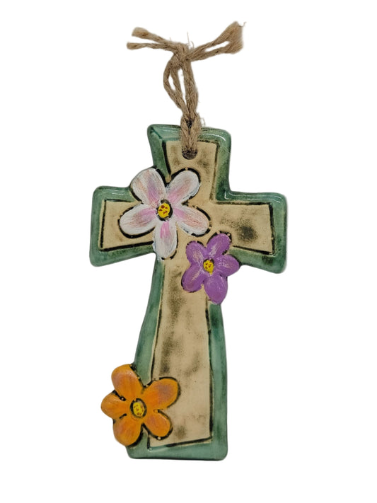 Decorative cross with flowers on a white background