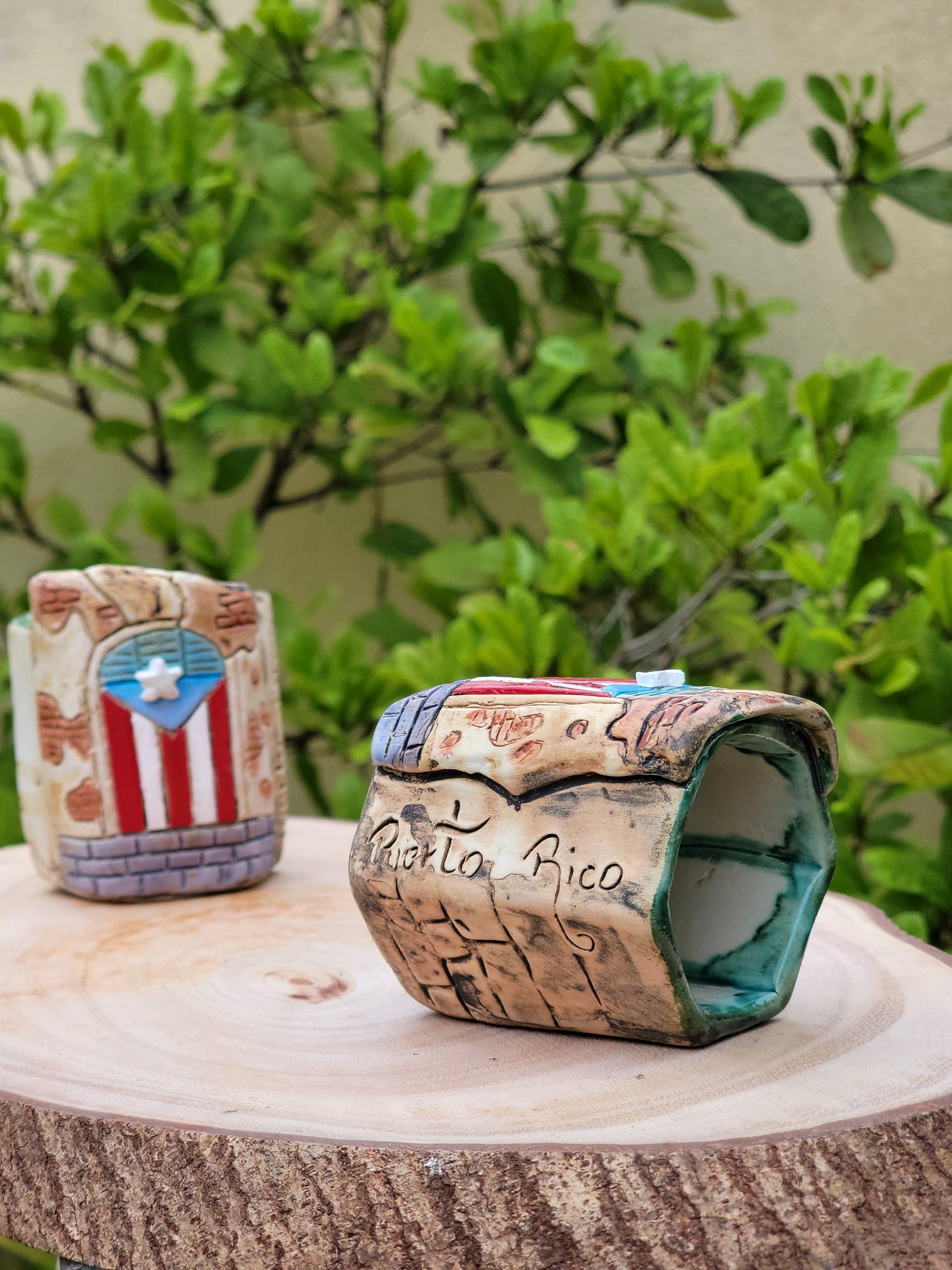 Hexagonal ceramic holder with Puerto Rican flag design on a wooden surface