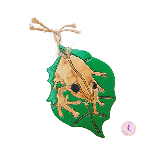 Coqui on leaf ceramic ornament